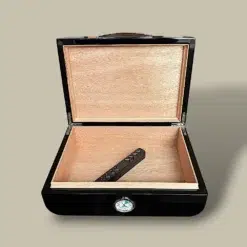 Open cigar humidor with cedar interior and humidifier bar